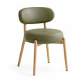 Chaise en bois et cuir synthétique vert