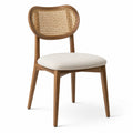 Chaise en bois avec dossier en rotin et assise en tissu beige