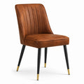 Chaise en cuir synthétique brun avec pieds en métal noir et extrémités dorées